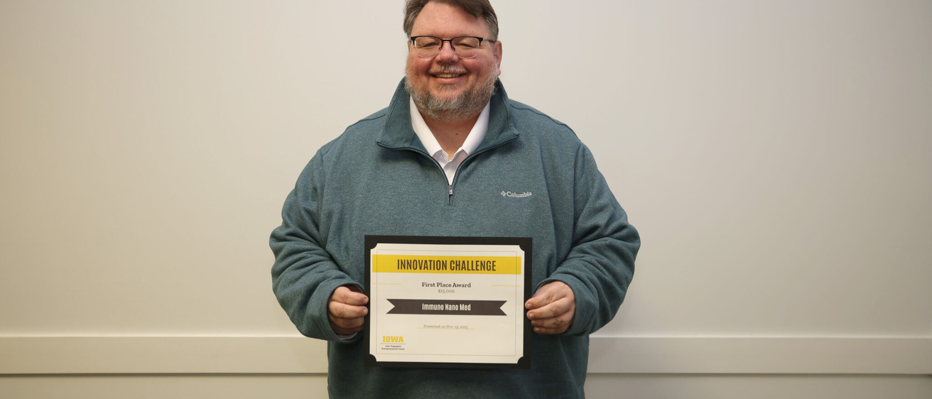 Kevin Legge with JPEC Award